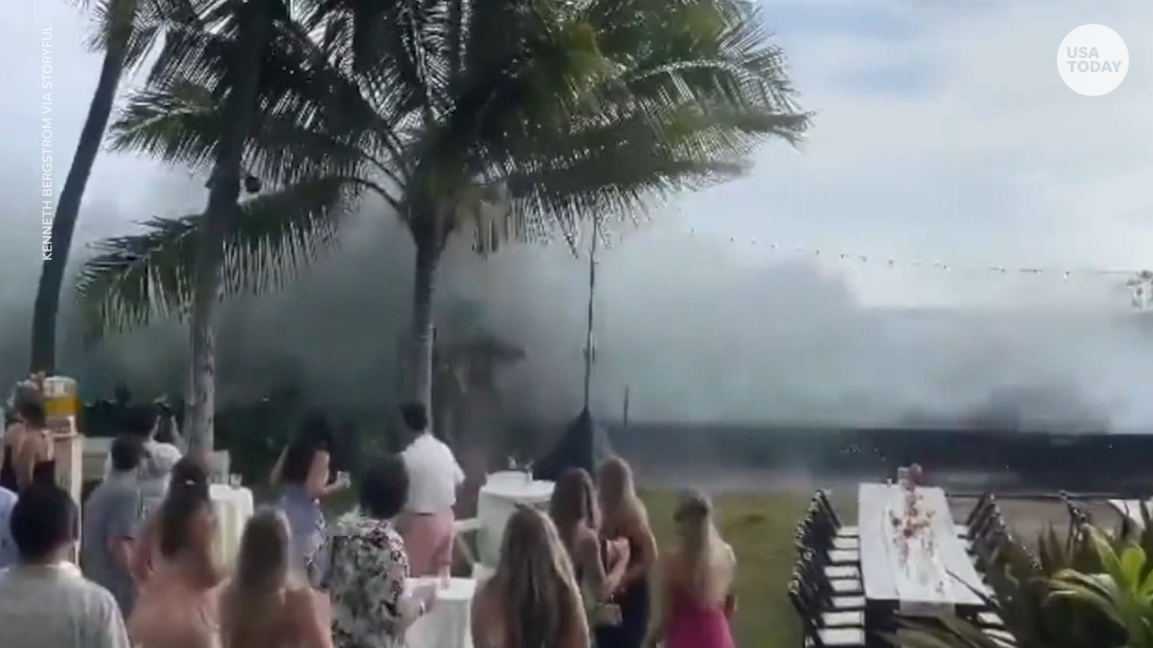 'Historic' surf conditions send waves crashing into wedding party at Hawaii coastal resort