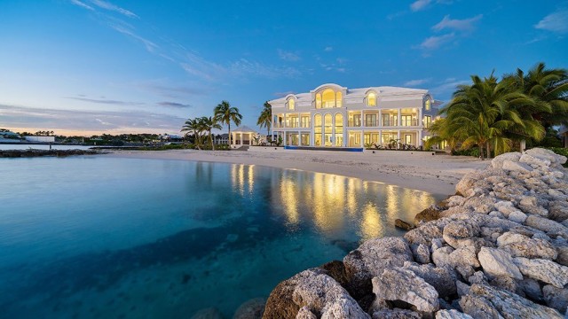 Home of the Week: This Soaring $32 Million Bahamian Mansion Comes With a Porsche and a Range Rover