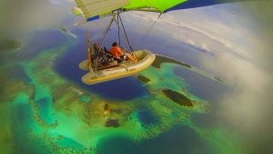 Must See! Man Flies Homemade Dinghy-Plane High in the Sky Over the South Pacific