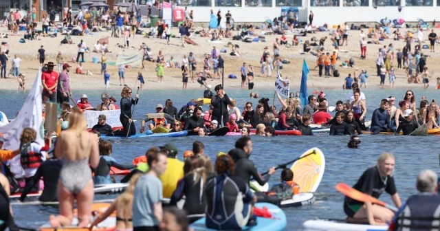 Hundreds take to the sea demanding G7 leaders protect the ocean