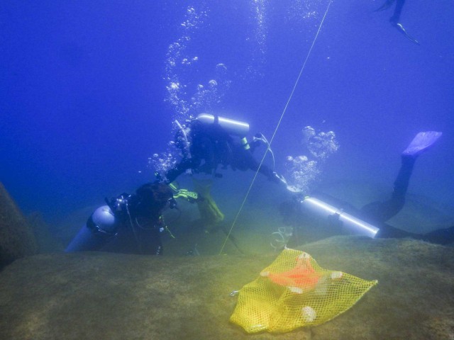 Divers pulled 25,000 pounds of trash from Lake Tahoe. Now they want to clean more Sierra lakes